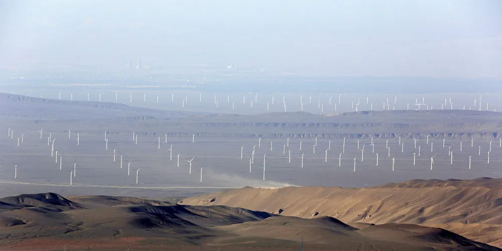 Turbines in China's northwestern Xinjiang Province. Beijing's focus has shifted from capacity to generation growth. Pic: PATRICK BAZ/AFP/Getty Images
