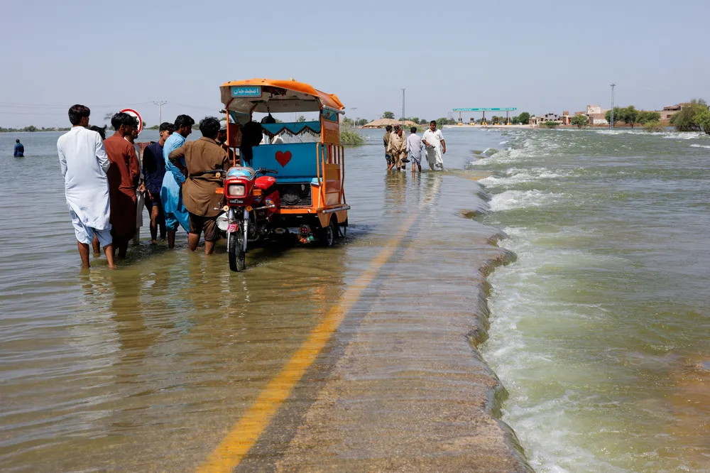Disruption: caused by torrential rain and flooding on a highway in Pakistan.