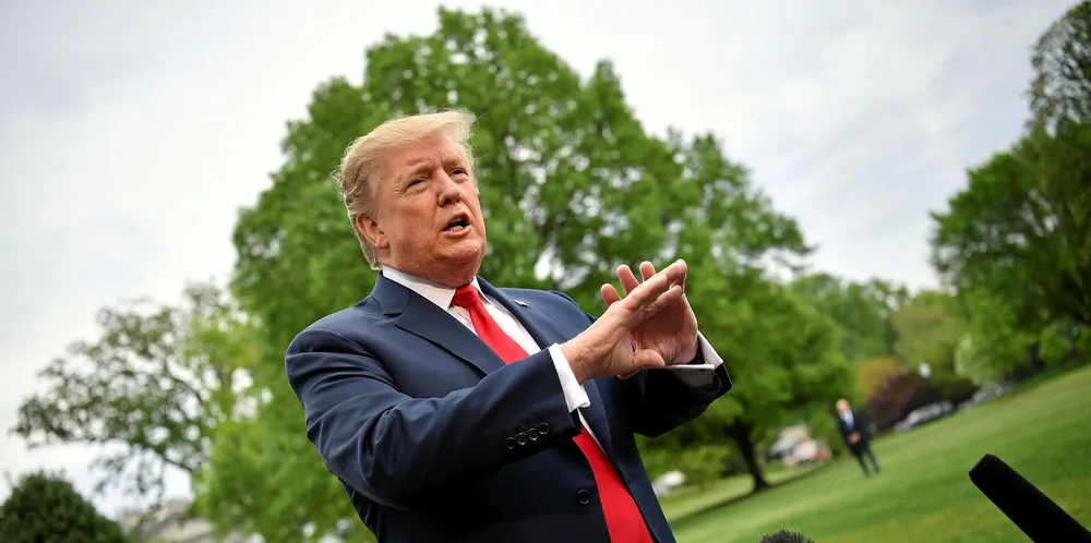 US President Donald Trump speaks to reporters.