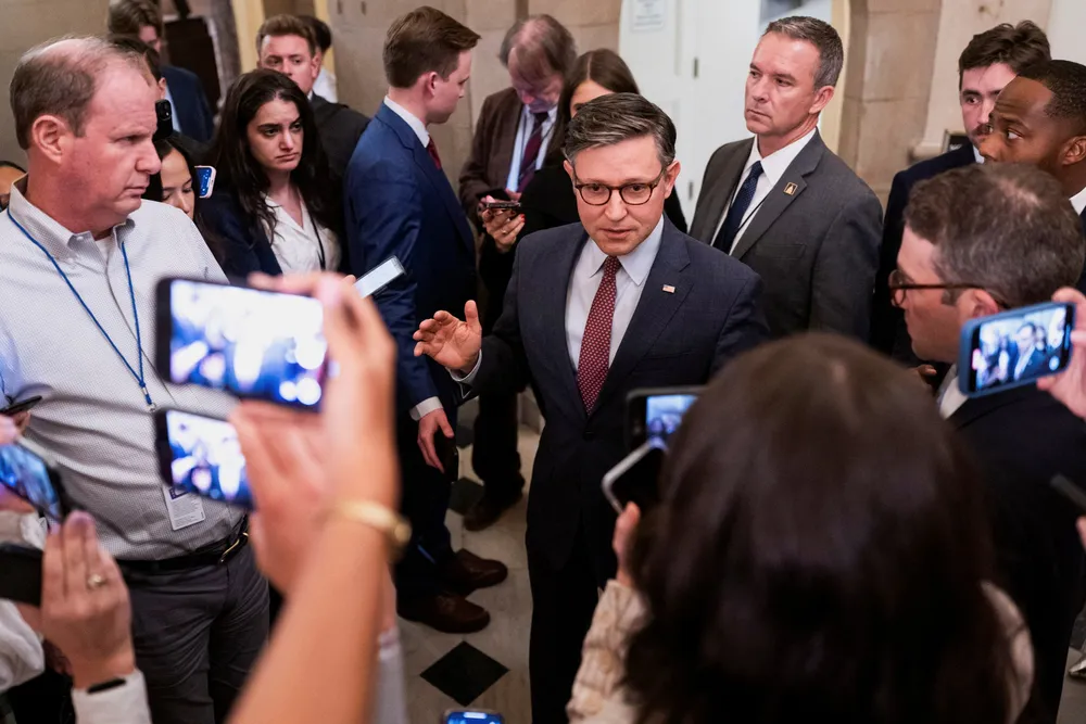 US House Speaker Mike Johnson speaks with members of the media ahead of a candlelight vigil commemorating fallen law enforcement officers on Capitol Hill in Washington, DC, US, on 13 May 2025.