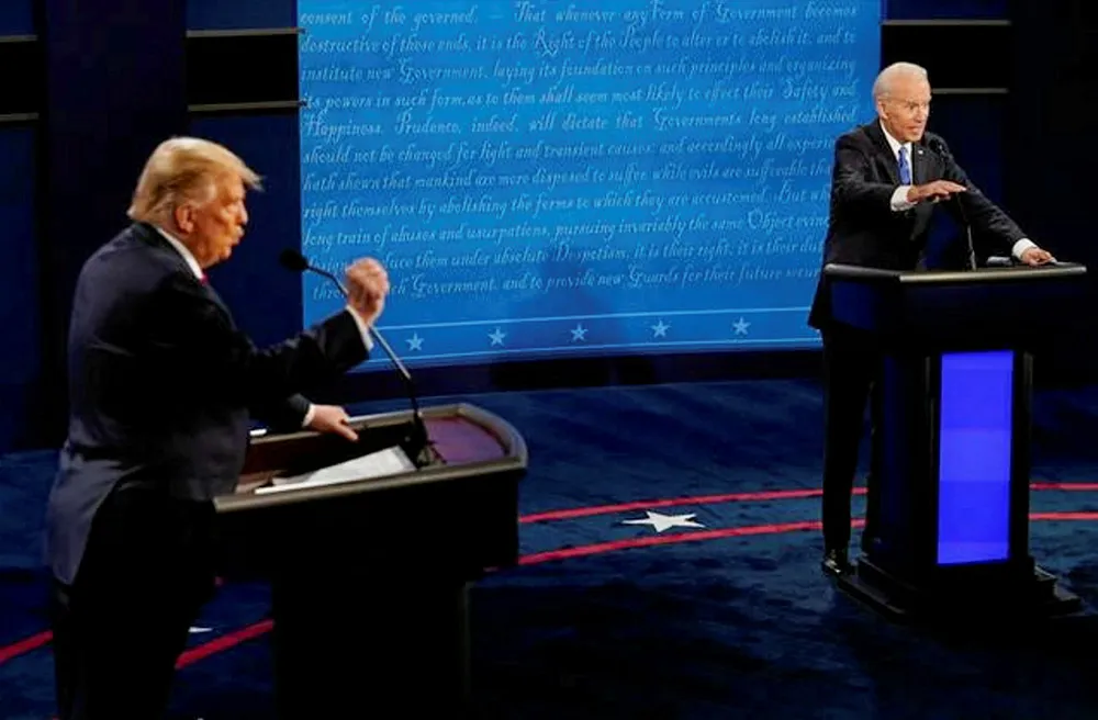 Clash: US President Donald Trump and challenger Joe Biden during the final debate of the 2020 election campaign last night