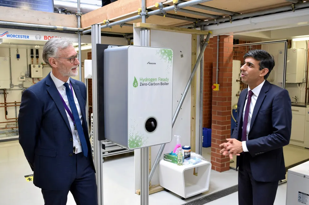 UK Prime Minister Rishi Sunak being shown a hydrogen-ready boiler manufactured by Worcester Bosch.