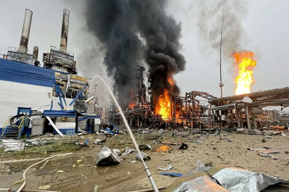 Chilling view: firefighters cooling the site of a major fire at the Gazprom-operated condensate processing facility in the Yamal-Nenets region in Russia