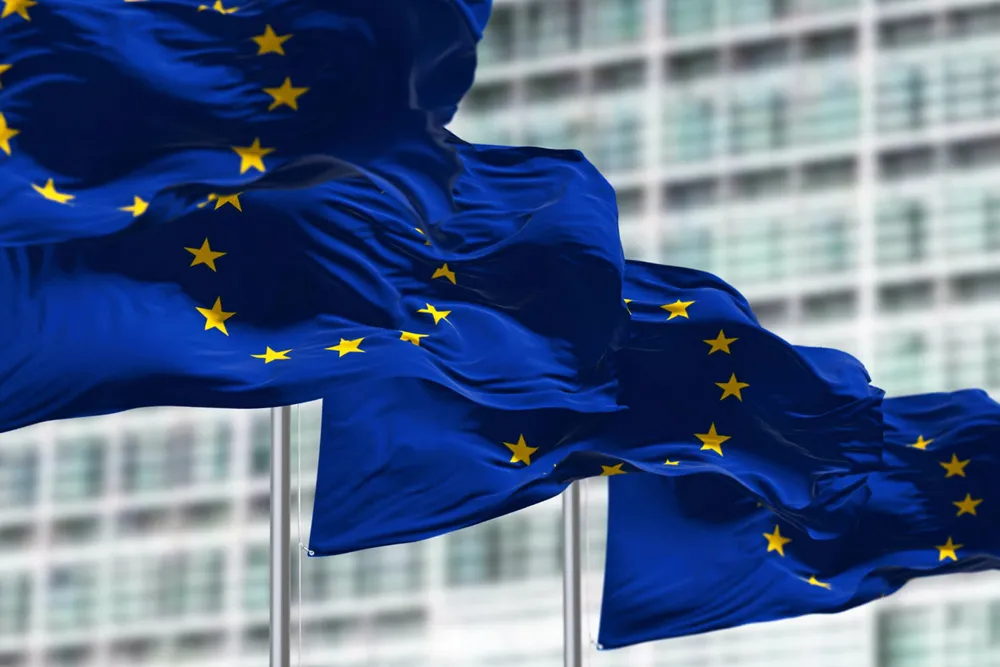 European Union flags outside the EU Parliament.