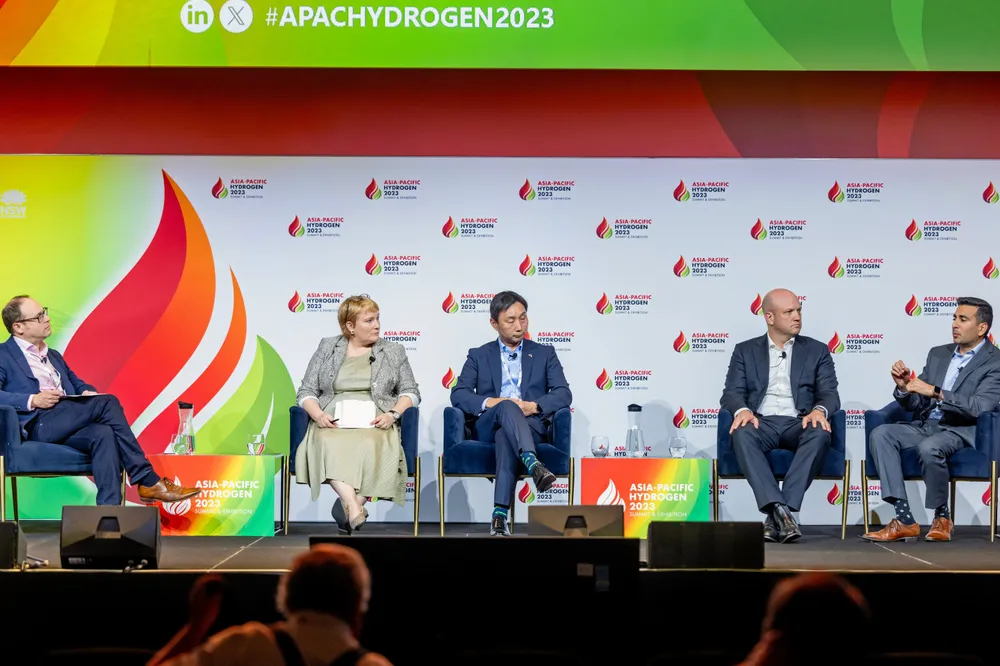 Hydrogen Insight editor Leigh Collins (left) speaks to Fiona Simon; Yoshi Saito from technology company SLB; Rupert Maloney; and Kobad Bhavnagri, at the Asia-Pacific Hydrogen Summit in Sydney on Friday.