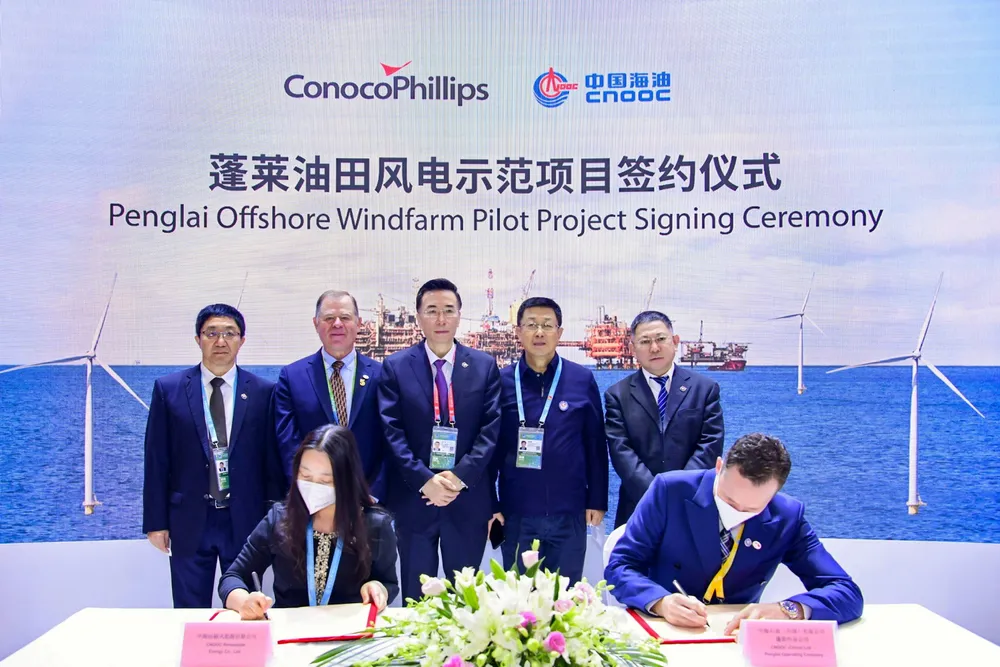 Done deal: signing the agreement for ConocoPhillips’ offshore wind farm in China’s Bohai Bay.