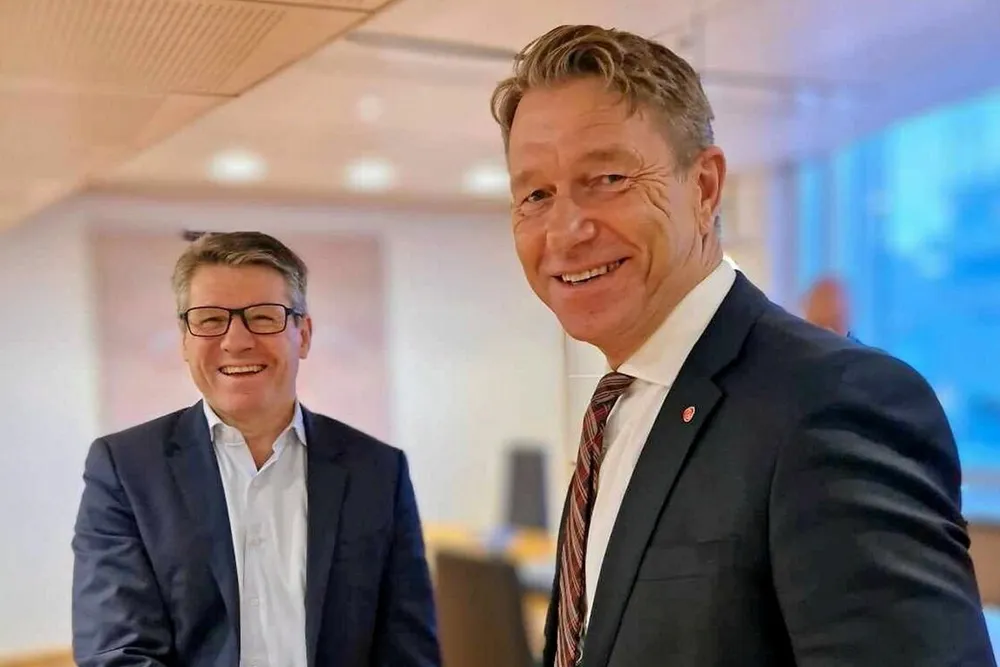 Energy Minister Terje Aasland, right, and Nick Walker, chief executive of one of Norway's most active explorers Vaar Energi