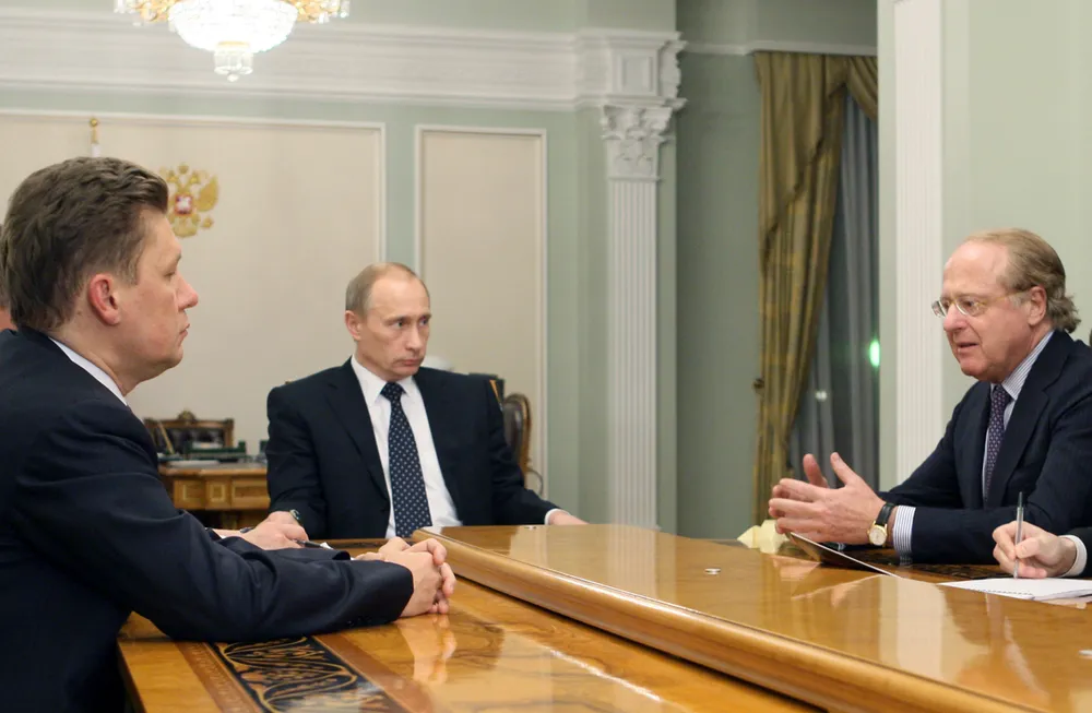Talking it over: Eni's Paolo Scaroni, right, meets with Russian Prime Minister Vladimir Putin, centre, and Gazprom boss Alexei Miller, left
