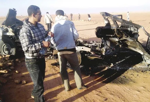 The wreckage of a vehicle near In Amenas