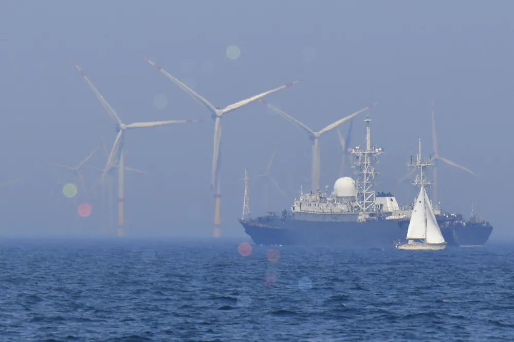 A ship sails past wind turbines at the Arkona wind park in the Baltic Sea, northern Germany.