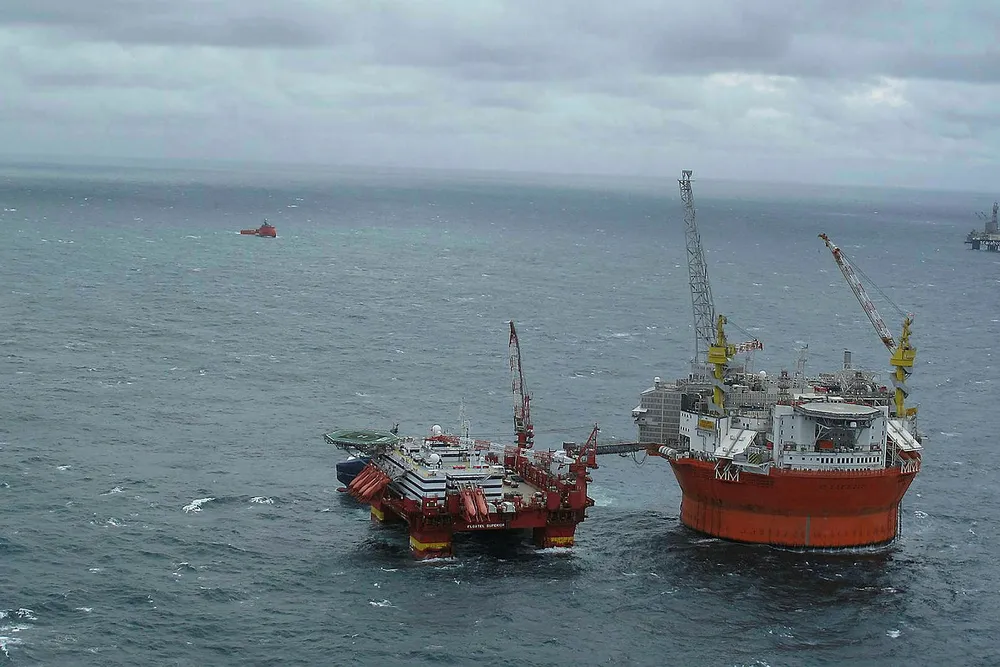 Goliat platform in Barents Sea with Floatel Superior moored alongside . .