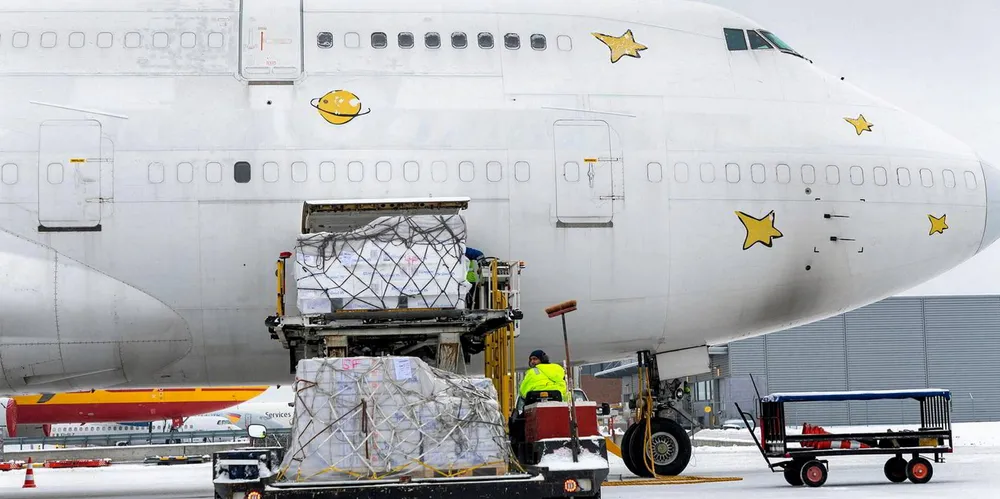 Pallets of Norwegian salmon are loaded onto flights direct to China.
