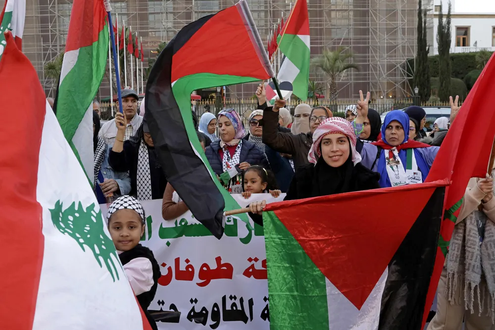 Demonstrators celebrate in Rabat following the news of a ceasefire and hostage release deal between Hamas and Israel.