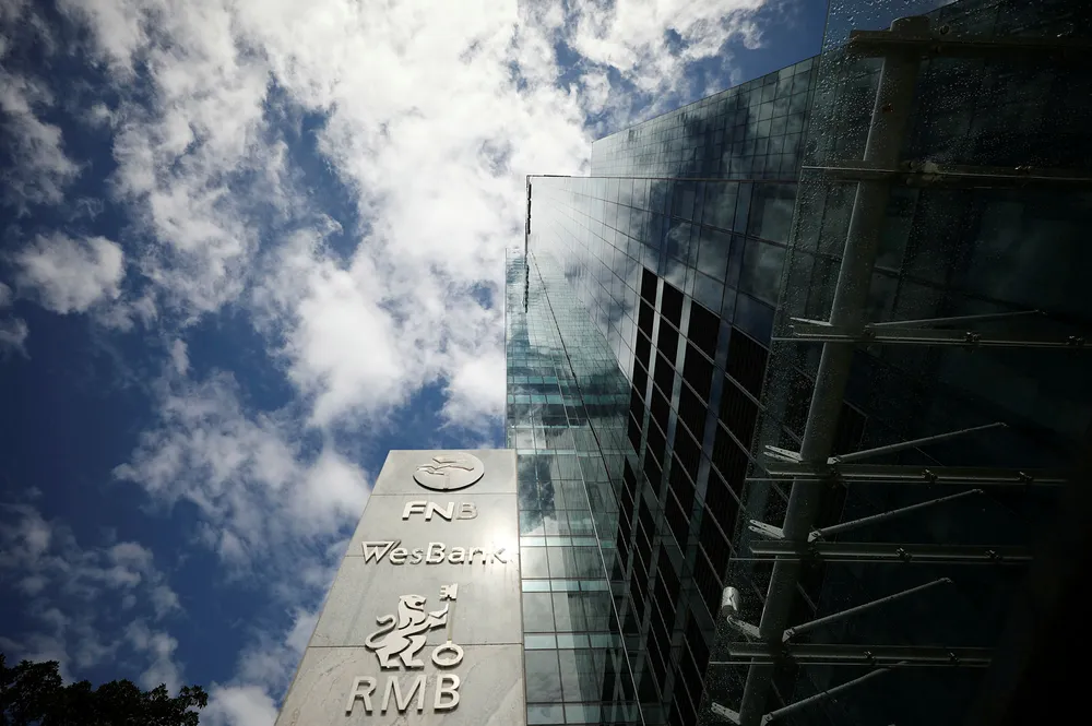 Finance: logos of Rand Merchant Bank (bottom), Wesbank and FNB are seen outside the FirstRand offices in Cape Town, South Africa