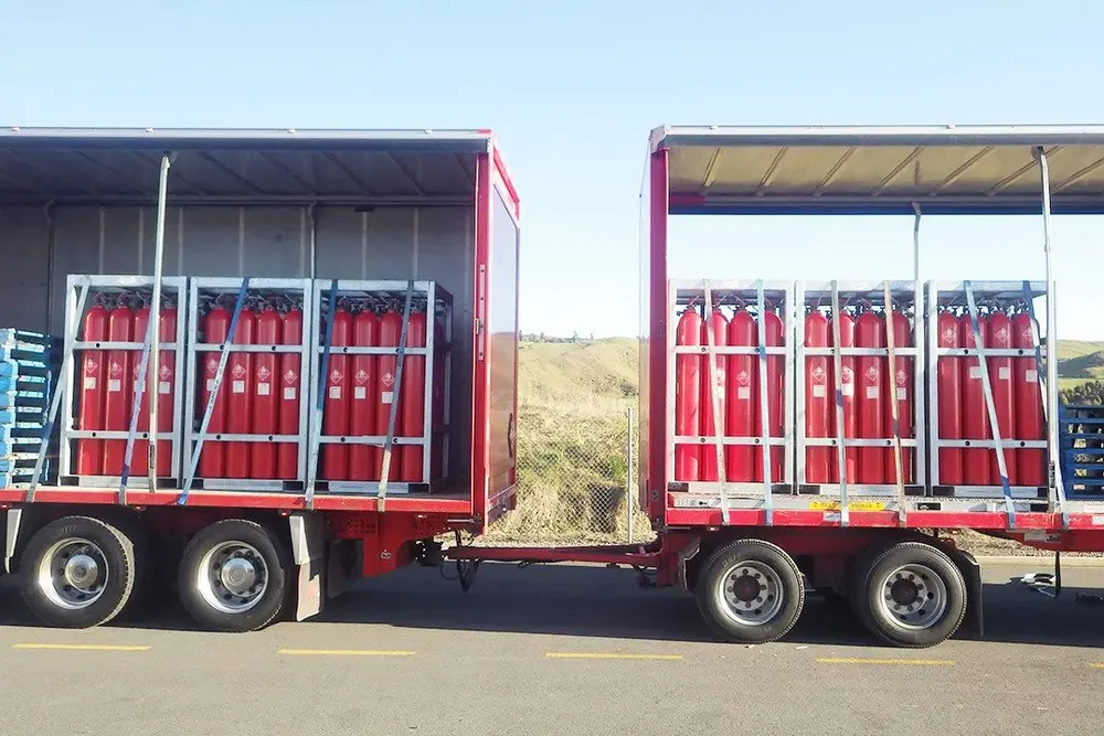 Hydrogen cylinders loaded onto trucks in New Zealand ahead of shipment to Fiji