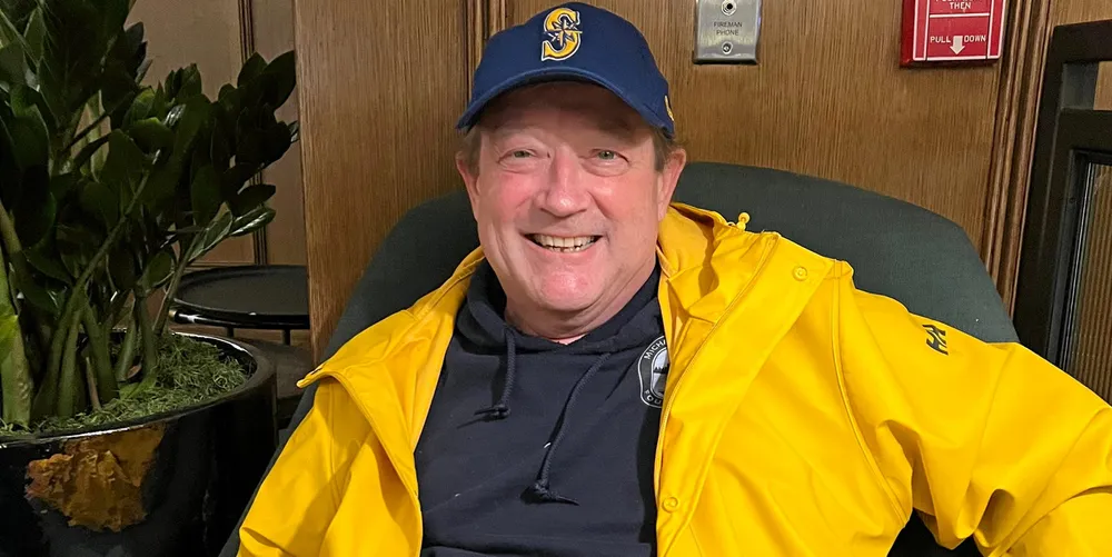 John Connelly dons his Seattle Mariners hat at the GOAL 2022 conference in Seattle, where he was honored with a lifetime achievement award.