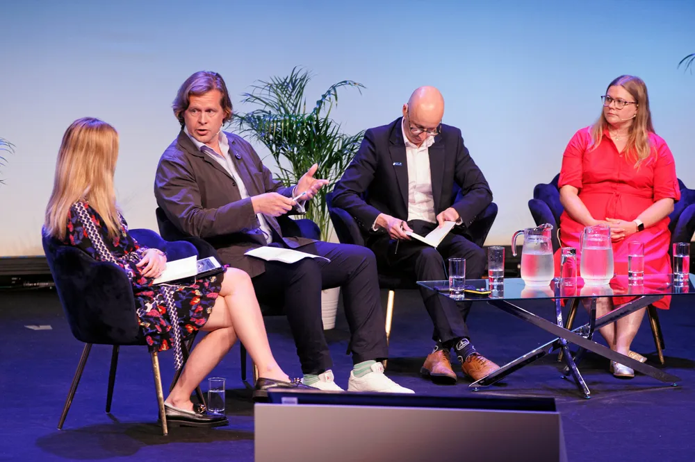 Direct cash payments to households affected by new infrastructure are popular with the public but "fraught with complication," said Stuart Barnes, head of government and stakeholder affairs at German developer EnBW (centre left).