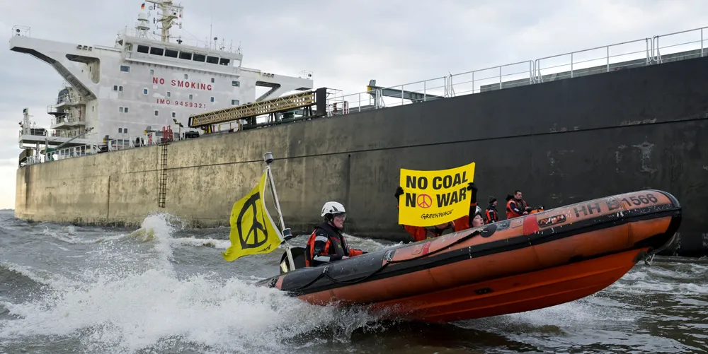 Activists from Greenpeace protest as the 115,000-dwt bulker Grand T (built 2011) delivered a cargo of Russian coal in Hamburg on 4 March. After Russia’s invasion of Ukraine, European nations have been importing more coal from South Africa and Australia.