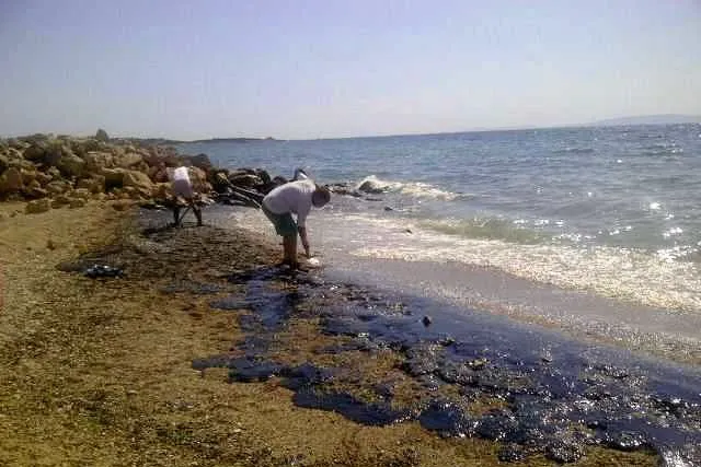 Oil spilled from the Agia Zoni II in 2017 washes up on a beach at Glyfada, near Athens.