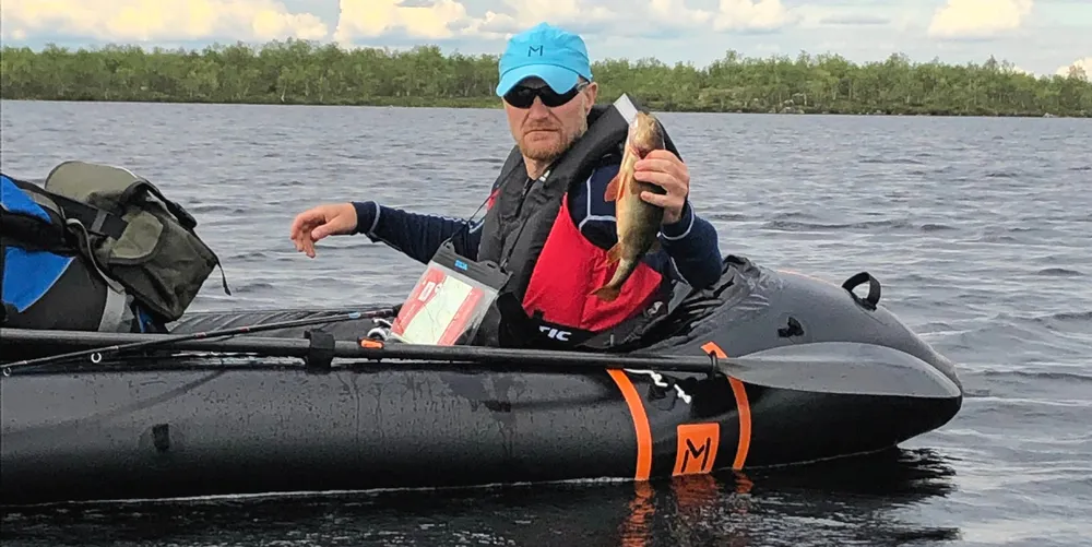 Geir Wenbergs nye liv: En lakseoppdretter spiser også abbor. Her fra Karasjokka på Finnmarksvidda.