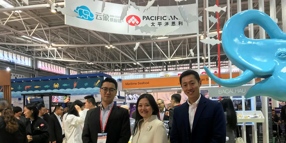 Win-Chain's John Liu and Eason Li with Pacific Andes Managing Director Jessie Ng.