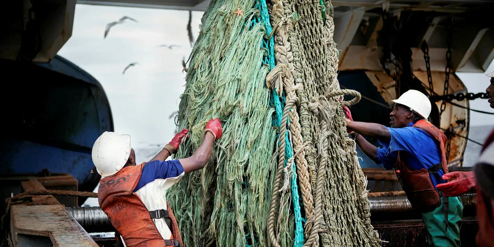 Fishermen on board a South African hake fishing vessel.