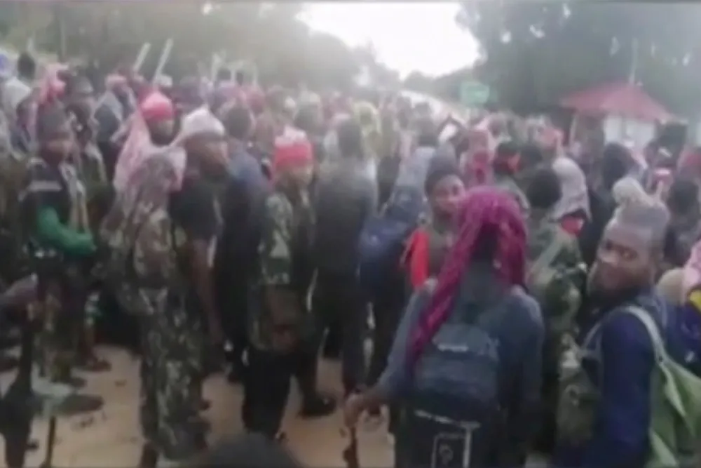 Insurgents: An image taken from a video released by the Islamic State group on 29 March, 2021, purporting to show fighters near Palma, Mozambique.