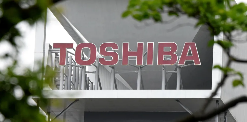 The logo of conglomerate Toshiba is seen at the headquarters in Tokyo.