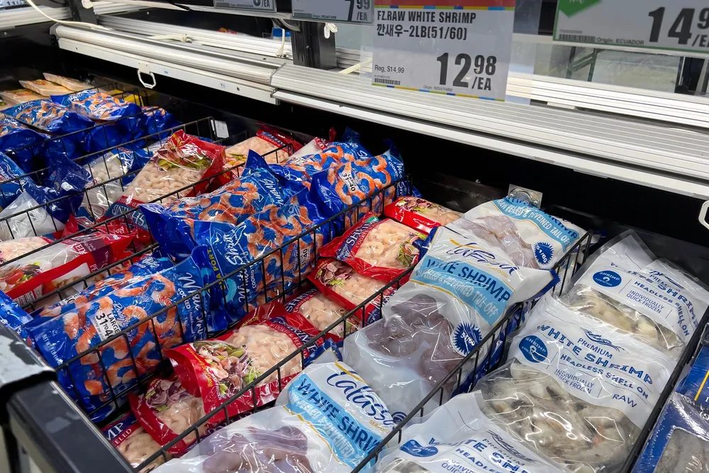 Frozen shrimp for sale inside an H Mart grocery store in the United States.
