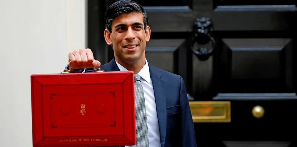Chancellor of the Exchequer Rishi Sunak posing for pictures with the Budget Box outside 11 Downing Street on Wednesday.