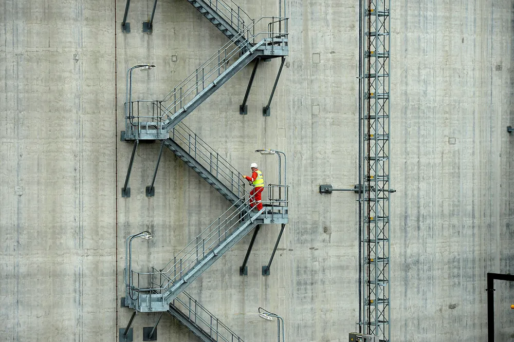 Capacity deal: a man walks up a storage tank at National Grid's liquefied natural gas plant at the Isle of Grain
