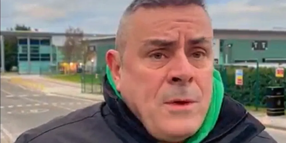 Mark McHugh, Regional Officer with Bakers Food & Allied Workers Union (BFAWU) outside salmon farmer Mowi's processing plant in Rosyth, Scotland.