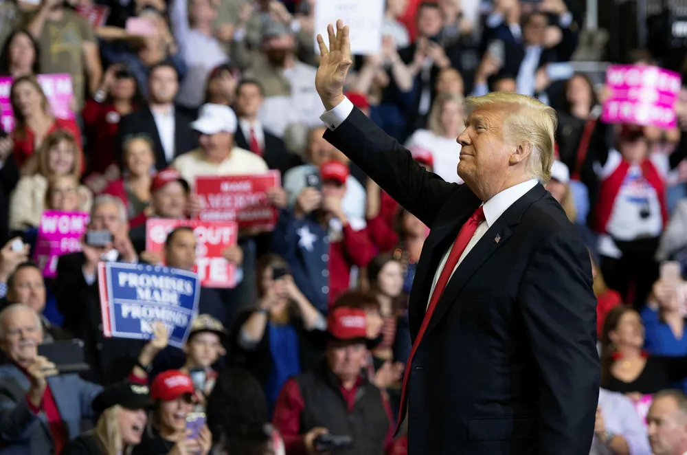 US President Donald Trump arrives for a campaign rally at the Toyota Center in Houston, Texas, on October 22, 2018. (Photo by SAUL LOEB / AFP)