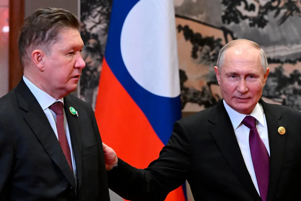 Executive board chairman of Russian Gazprom, Alexei Miller (left) and Russian President Vladimir Putin.