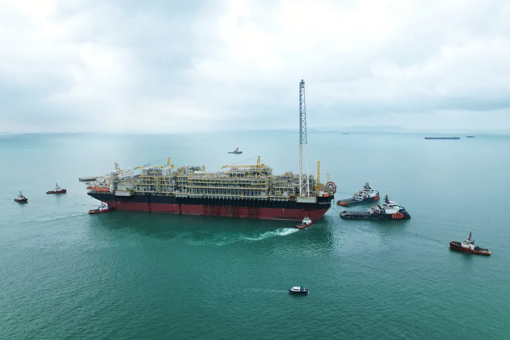 Bacalhau FPSO sailing away from Seatrium shipyard in Singapore to Brazil.