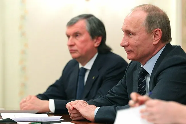 Sanctioned: Igor Sechin (left) hit by latest round of measures from US over ties to Vladimir Putin