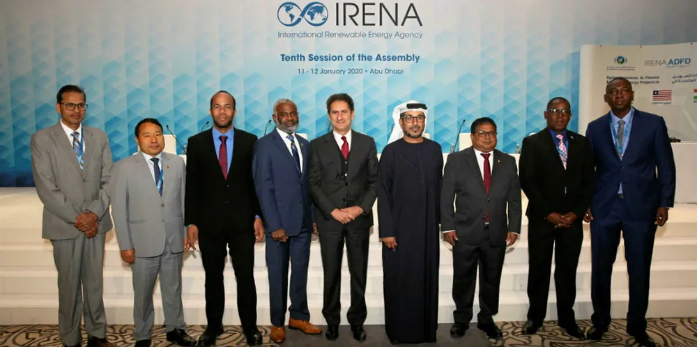 Irena director-general Francesco La Camera (centre) with represenatives of the eight recipient countries.