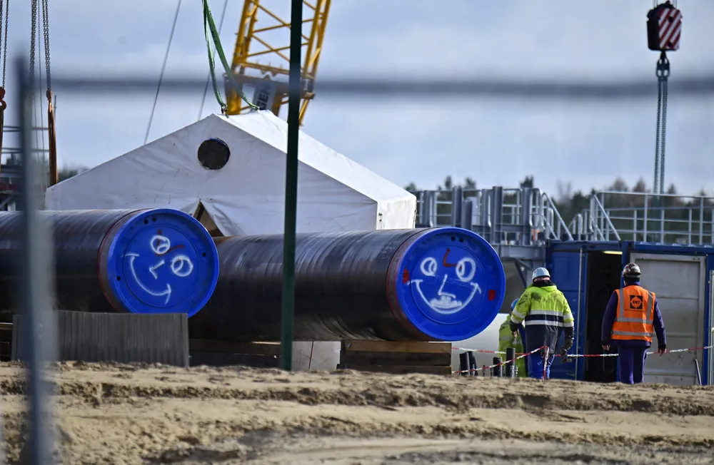 Fake smiles: Nord Stream 2 pipe sections in storage near Lubmin in Germany