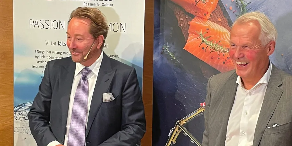 Aker founder Kjell Inge Rokke with SalMar CEO Gustav Witzoe.
