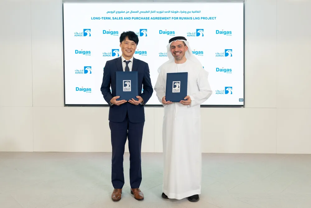 Osaka Gas executive vice president Keiji Takemori (left) and Adnoc senior vice president of marketing Rashid Khalfan Al Mazrouei (right) sign a new long-term gas supply deal.