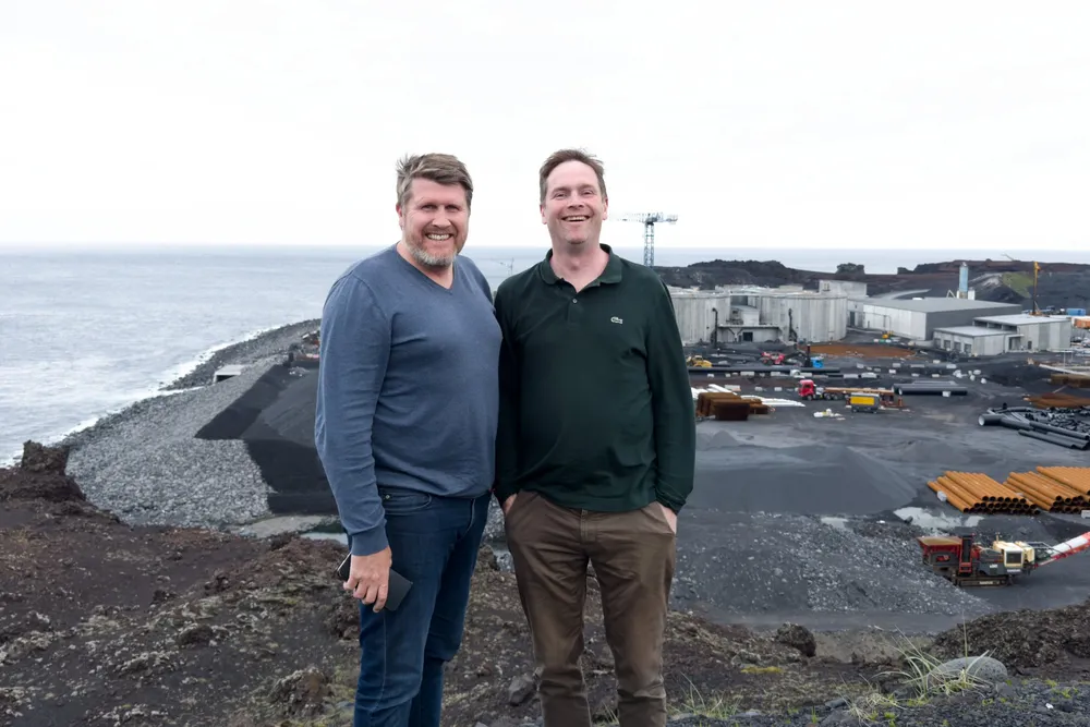 Laxey CEO Dadi Palsson (left) and COO Hallgrimur Steinsson (right) and in front of the Vestmannaeyjar-based hybrid flow-through project.