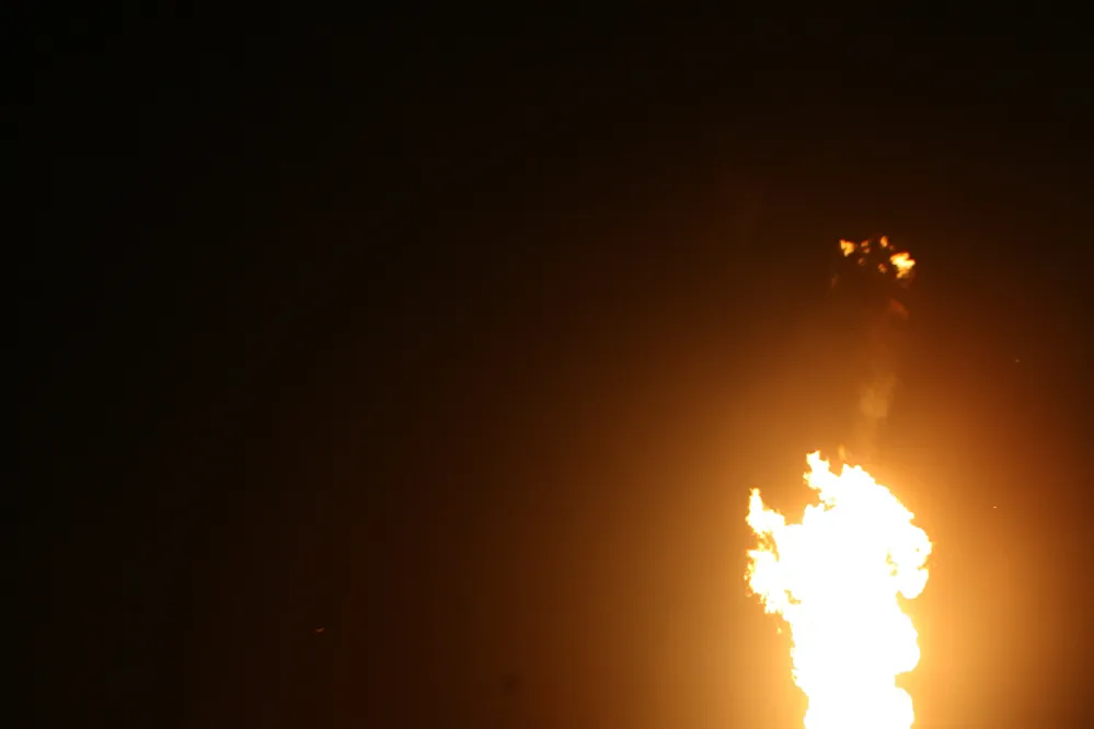 Nigerian buy-in: a gas flare in the volatile Niger Delta where OPL 205 lies