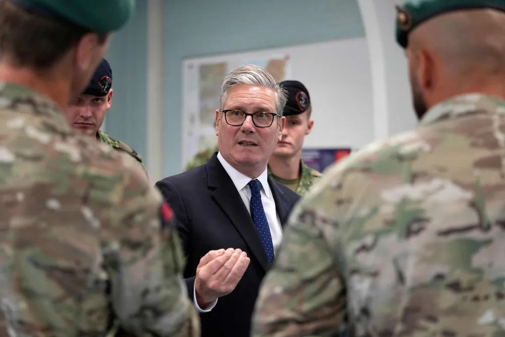 UK Prime Minister Keir Starmer speaks to soldiers during a visit at a Dutch marine training centre, as part of the UK-Netherlands Joint Amphibious Force in Rotterdam, on the sidelines of the two-day NATO's Heads of State and Government summit in The Hague on Tuesday.