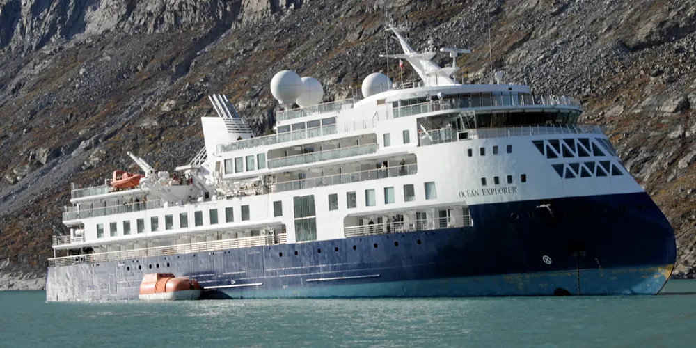 The expedition cruise ship Ocean Explorer aground in the Alpefjord in Greenland.