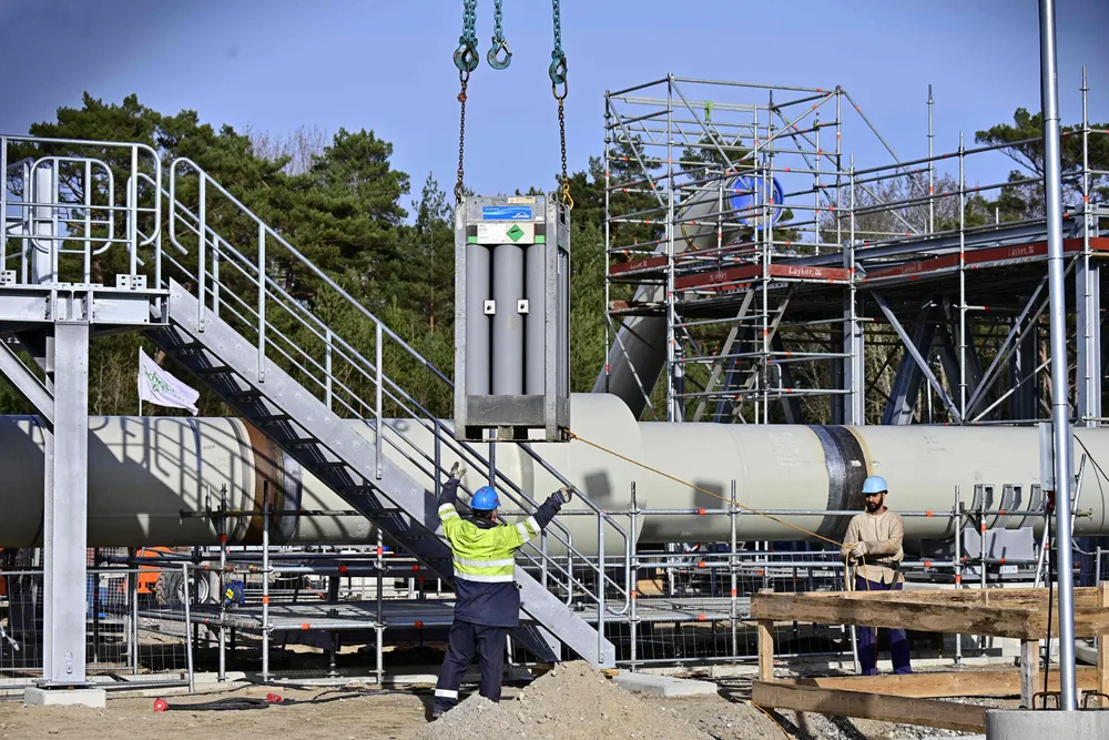 Men working at the construction site of the so-called Nord Stream 2 gas pipeline in Lubmin, northeastern Germany, on March 26, 2019.