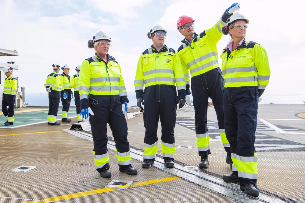Aker BP chief executive Karl Johnny Hersvik with guests on the Valhall field