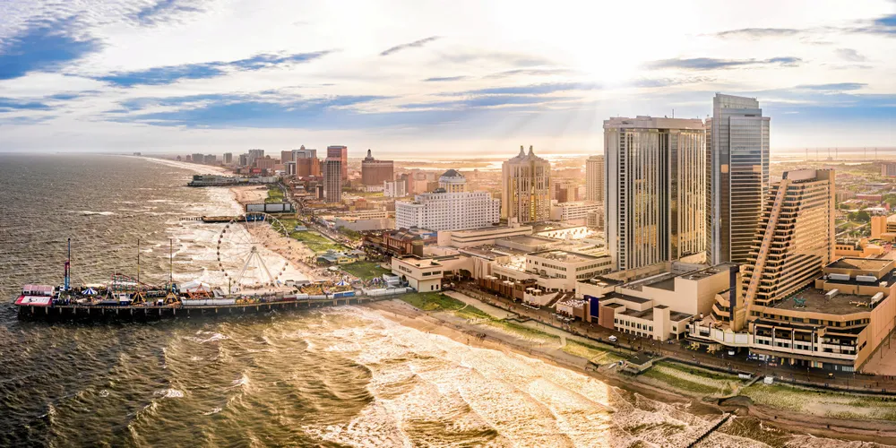 Late afternoon aerial panorama of Atlantic city along the boardwalk.