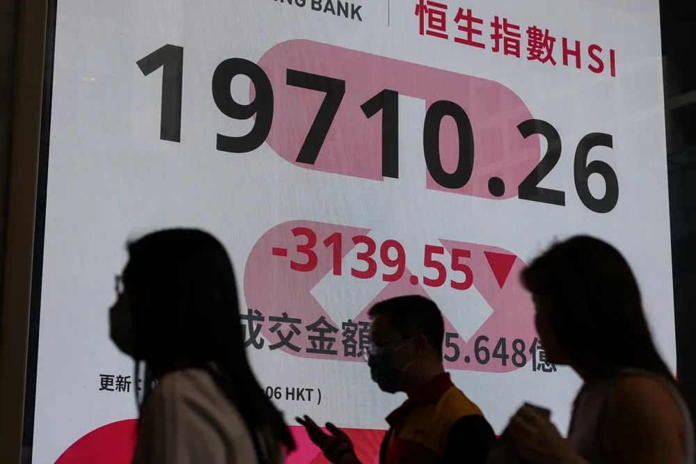 A screen displaying the closing Hang Seng Index in Hong Kong, China, on Monday.