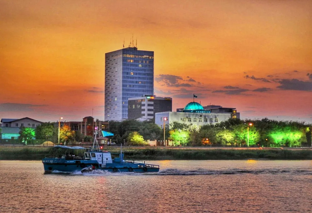 New auction: a vessel sailing along the Ural river in the city of Atyrau in Kazakhstan