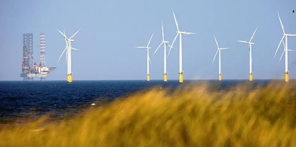 Royal Dutch Shell Plc's Brent Delta Oil And Gas Platform Waits To Be Dismantled. A jack-up rig stands near to Teesside Offshore Wind Farm, operated by EDF Energy Renewables Ltd., in Hartlepool, U.K.